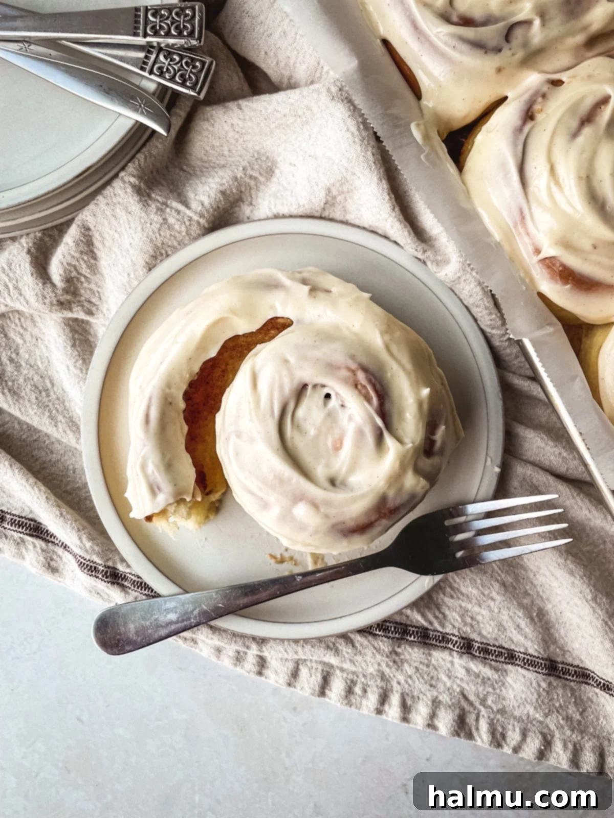 Golden Brown Butter Brioche Cinnamon Swirls 3 A close-up shot of brown butter in a saucepan, showing the golden liquid and the toasted brown bits at the bottom.