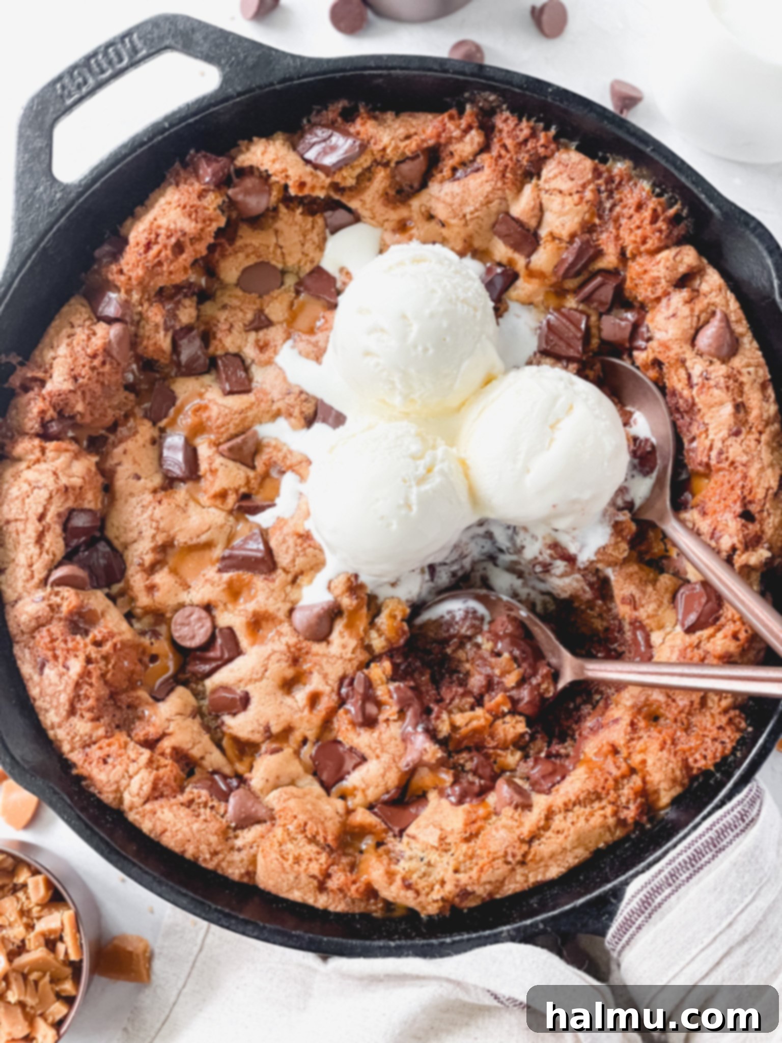Gooey Brown Butter Toffee Skillet Cookie 2 Delicious brown butter toffee skillet cookie, baked in a cast iron pan, ready to be served.