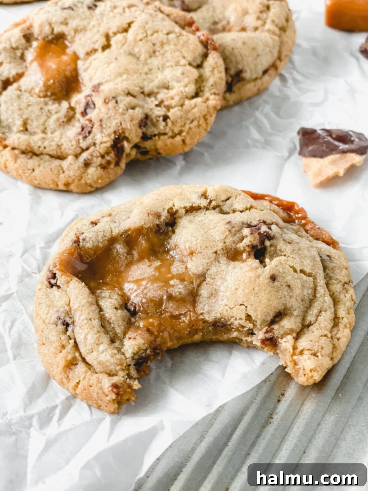 Close-up of a Caramel Cone Crunch Cookie showing the caramel pools and waffle cone pieces