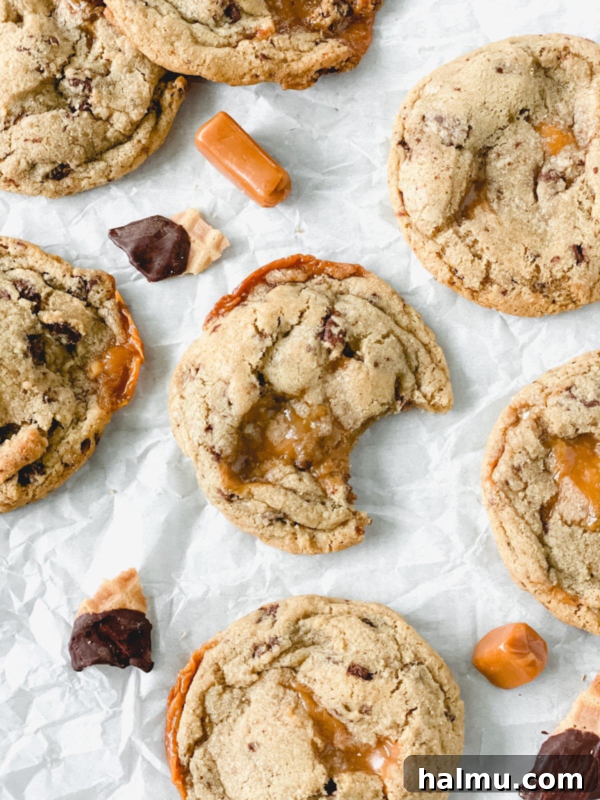 Waffle cone pieces being coated in melted chocolate