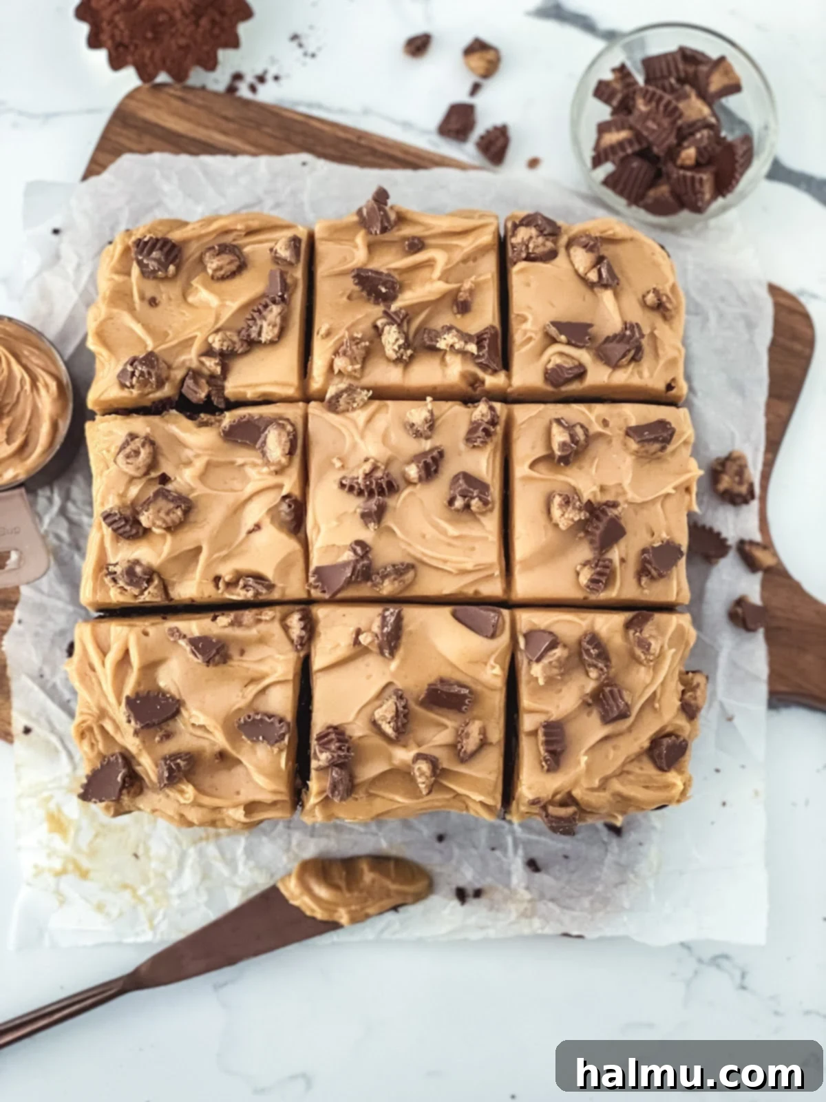 Chocolate Peanut Butter Dream Treat 8 A slice of Chocolate Peanut Butter Snack Cake on a plate, with a fork, ready to be eaten.