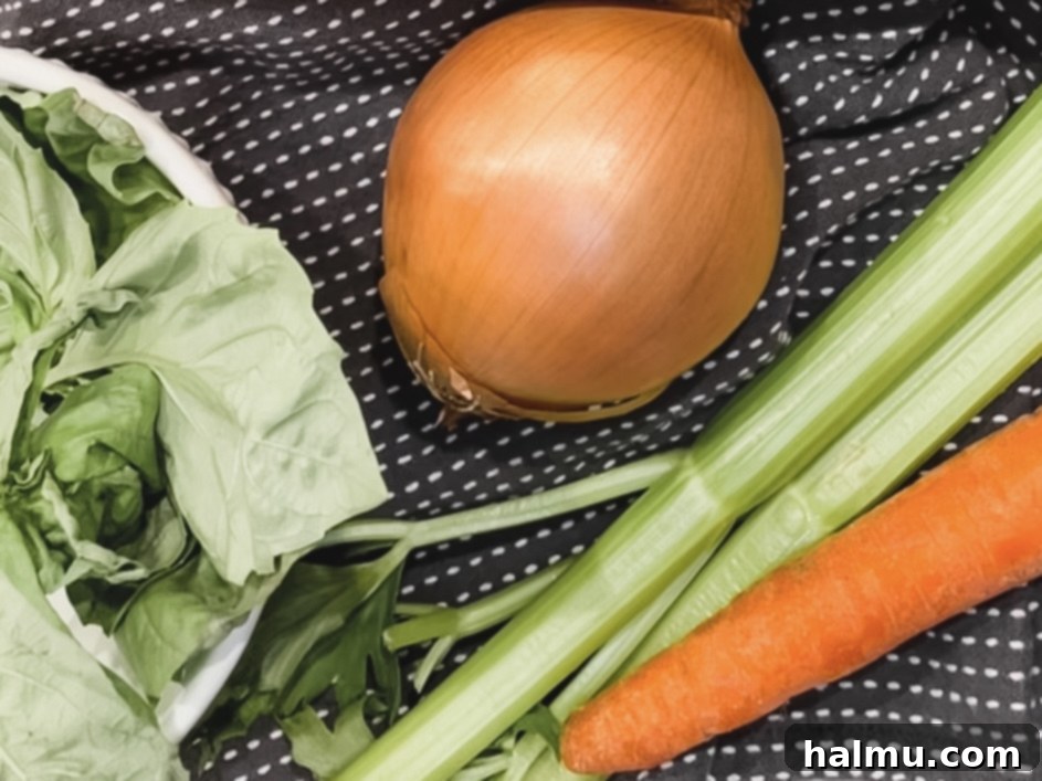 A large pot filled with creamy tomato basil soup, ready to be served.
