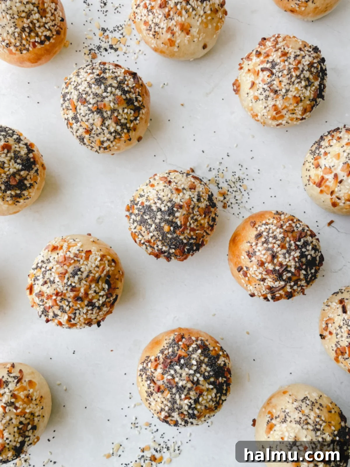 Stack of finished Everything Bagel Bites, showing their fluffy interior and creamy filling