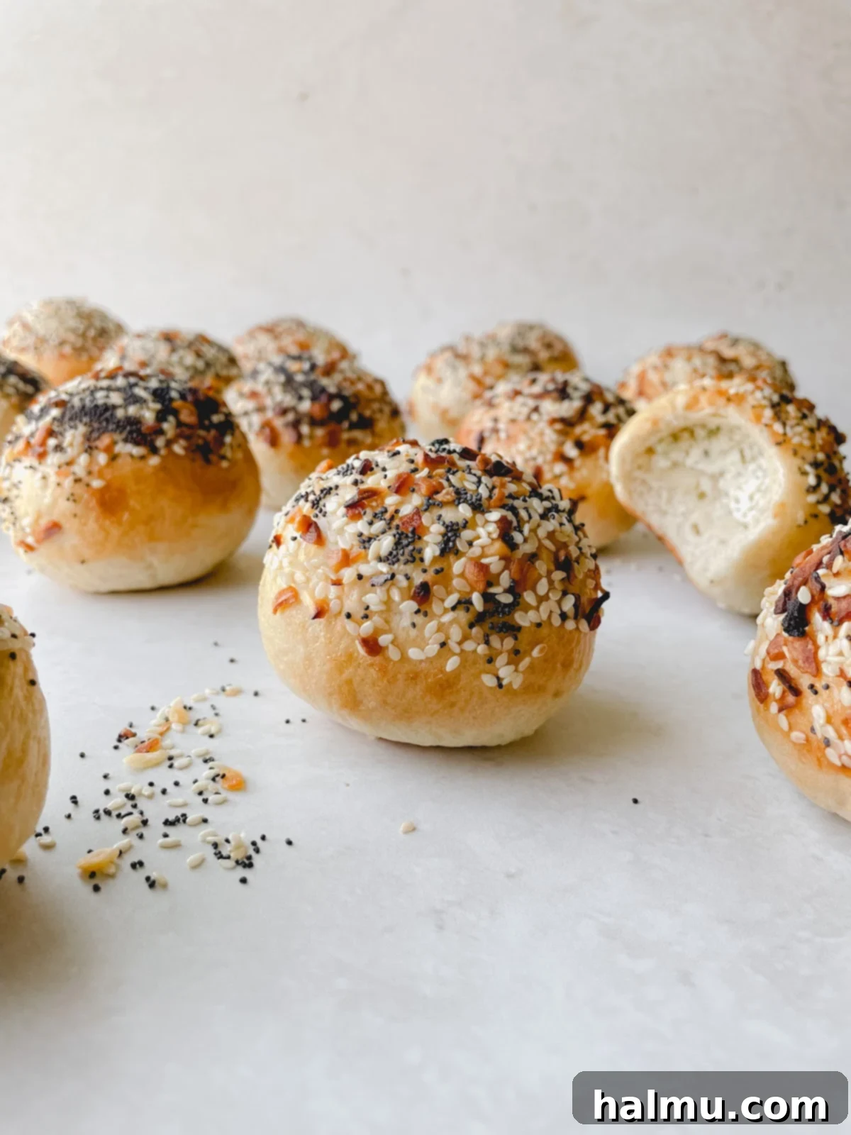 Close-up of a perfectly baked Everything Bagel Bite, showing the crispy exterior and generous seasoning