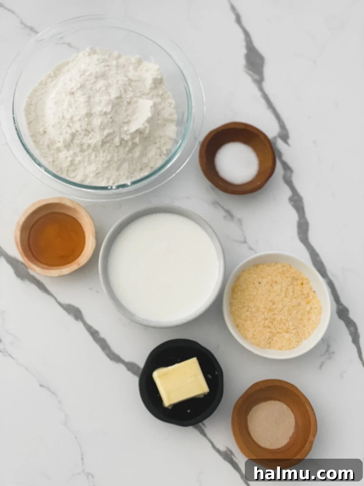Ingredients for English muffins laid out on a kitchen counter