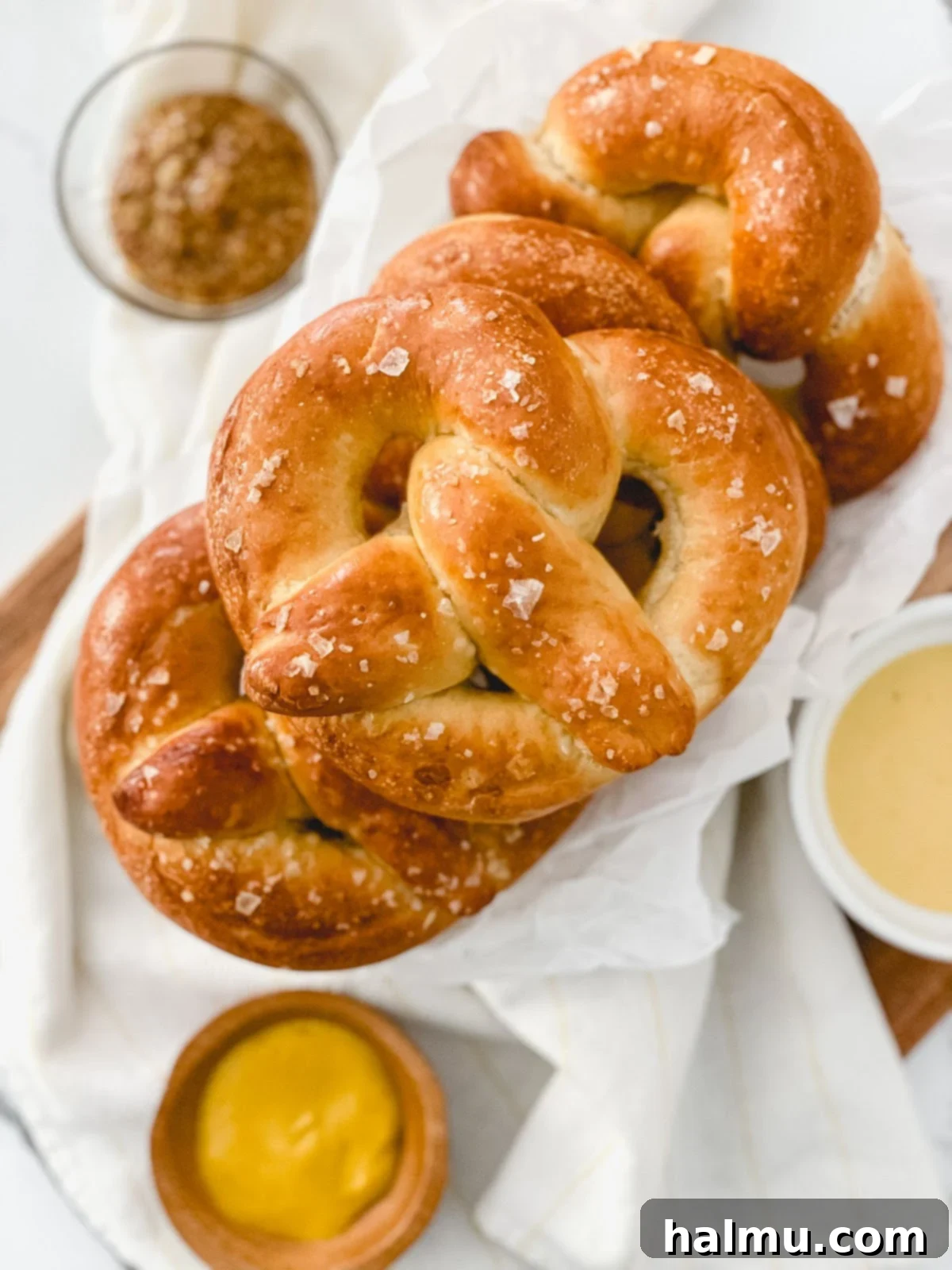Homemade soft pretzels drizzled with sweet icing and caramel sauce.