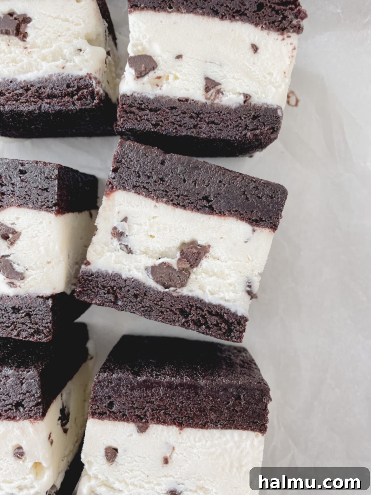 Refreshing Mint Chocolate Chip Ice Cream Delights 3 Close-up of brownie batter being spread into a parchment-lined baking pan, ready for the oven.