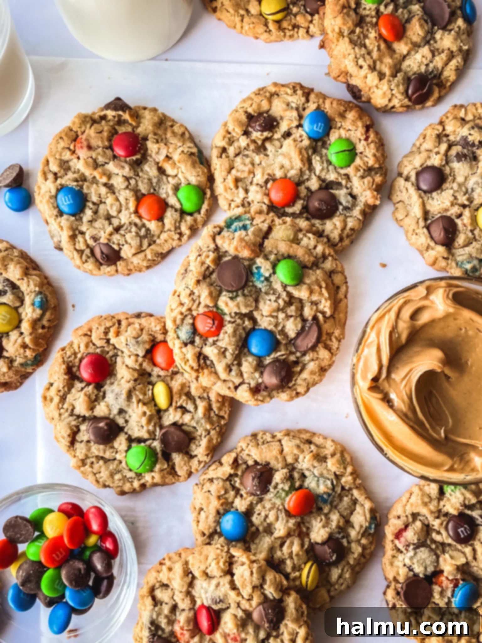 Deliciously soft and chewy Peanut Butter Monster Cookies loaded with chocolate chips and M&Ms