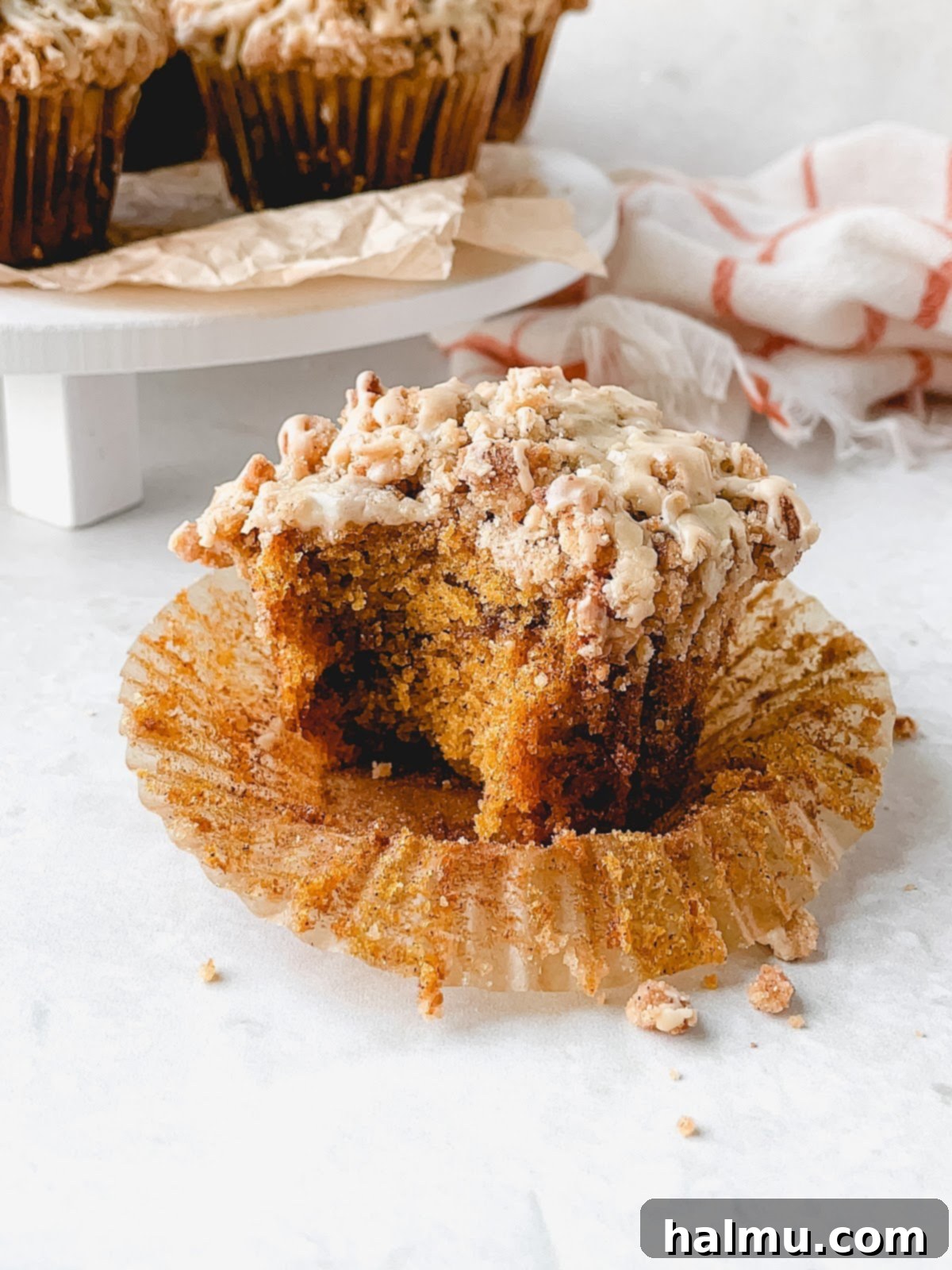 Harvest Pumpkin Cinnamon Crumble Muffins 4 Assortment of baking tools including a kitchen scale, muffin tin, and cookie scoops, essential for making pumpkin muffins.