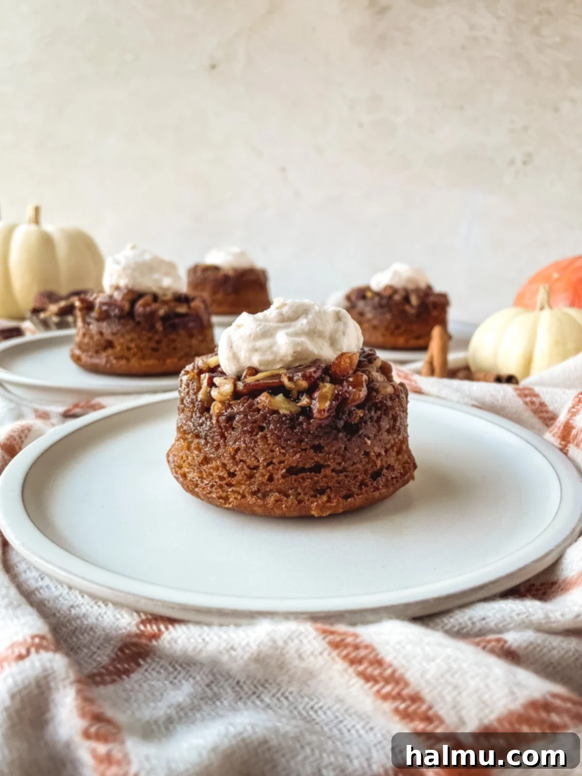 Caramel Pecan Pumpkin Flips 8 Individual pumpkin pecan upside-down cakes on a serving board