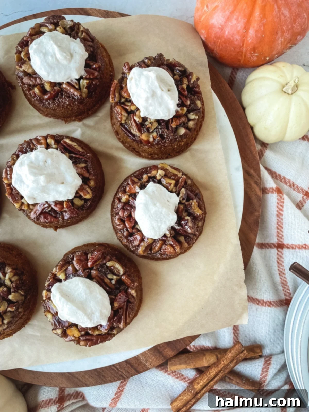 Caramel Pecan Pumpkin Flips 9 Close-up of a pumpkin pecan upside-down cake with whipped cream