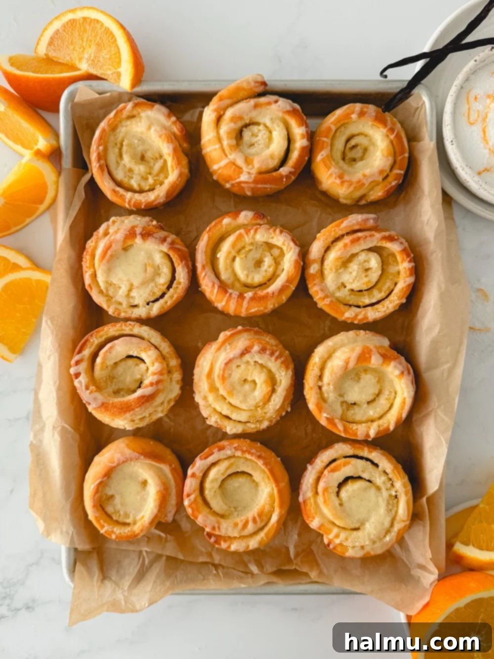 Delicious Vanilla Orange Brioche Rolls with a citrus glaze