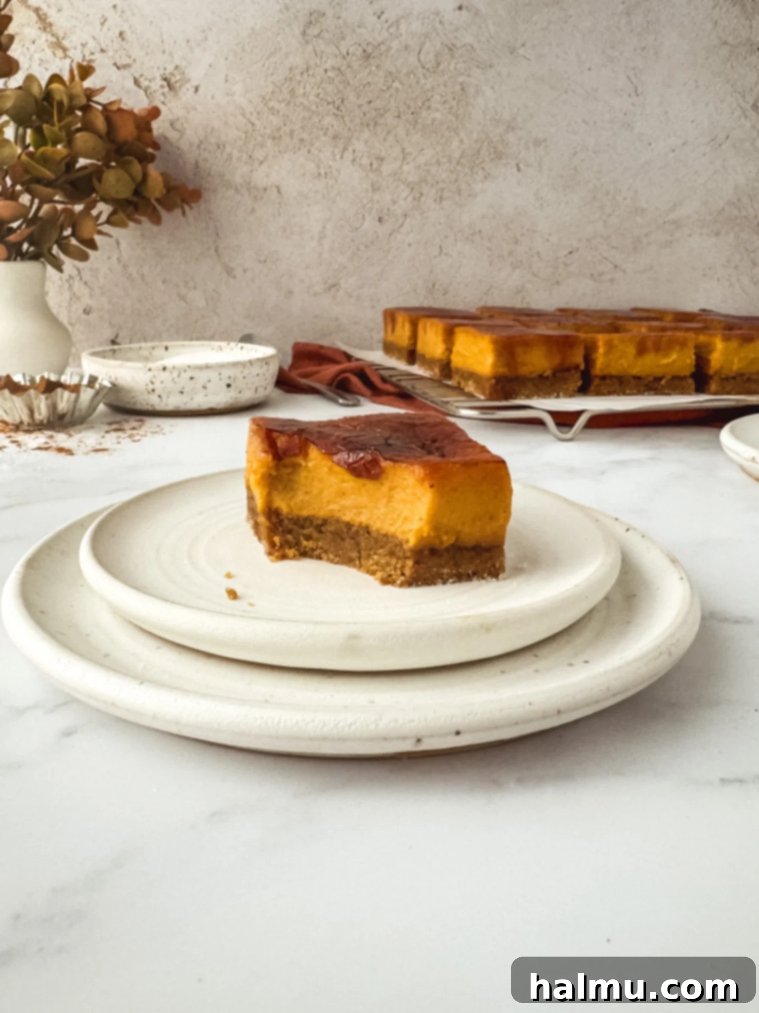 Rich Pumpkin Spice Crème Brûlée Bars with a crisp caramelized sugar topping, perfect for fall.