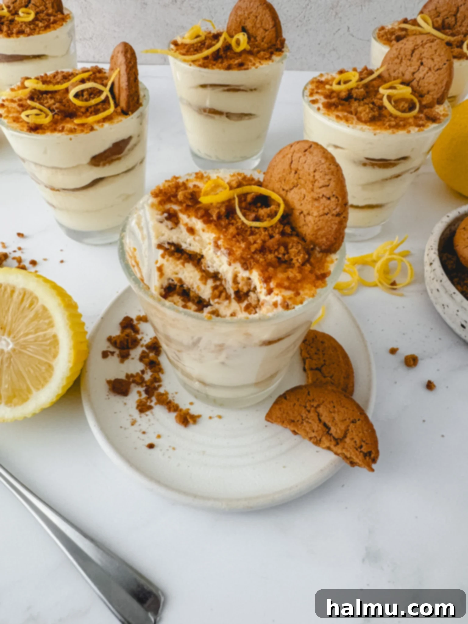 Zingy Gingersnap Tiramisu 3 Close-up of a Lemon Gingersnap Tiramisu, showing distinct layers of lemon mousse and gingersnap cookies.