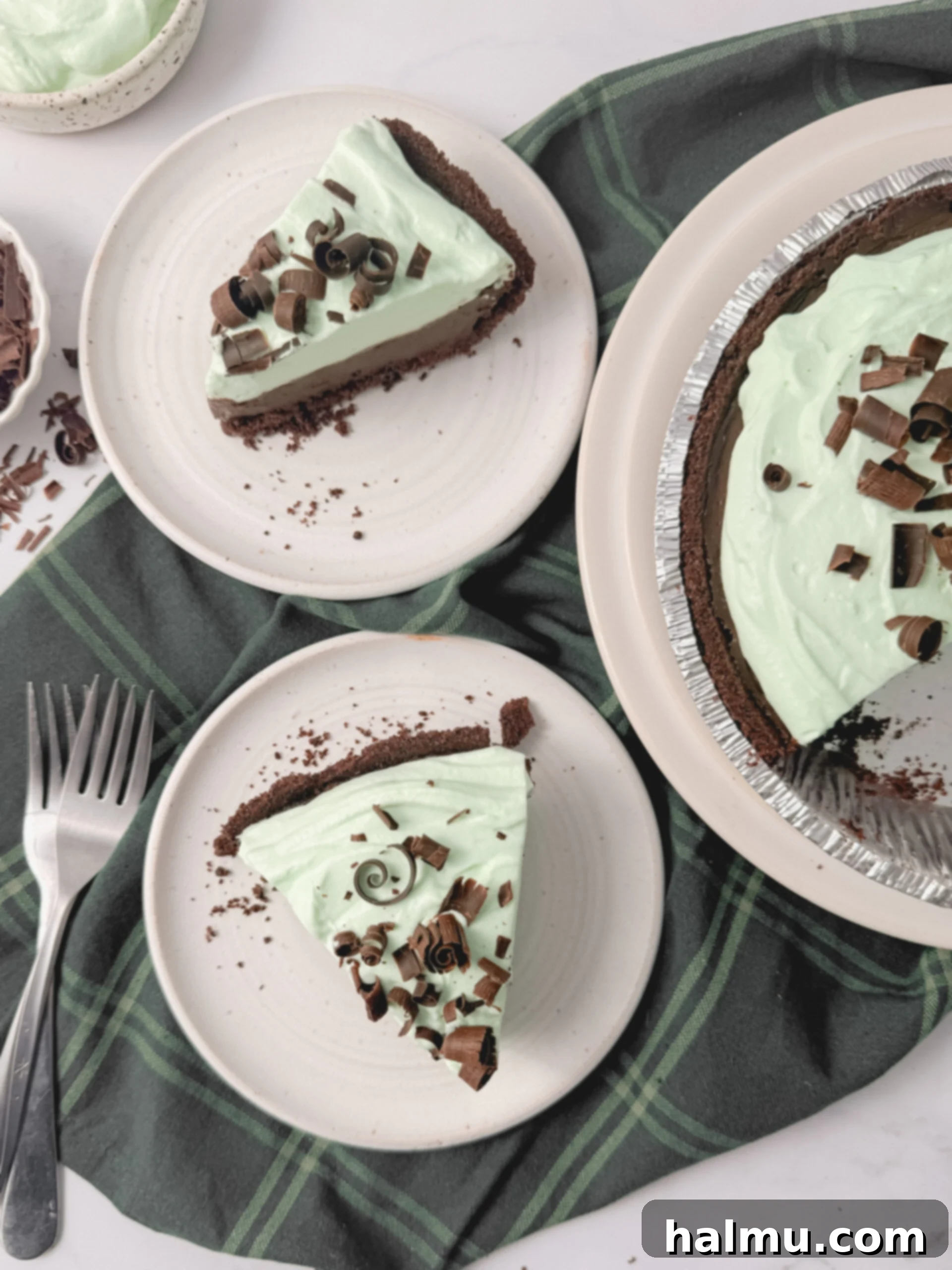 Close-up of freshly made chocolate curls, showcasing their delicate texture and glossy finish, ready for garnish.