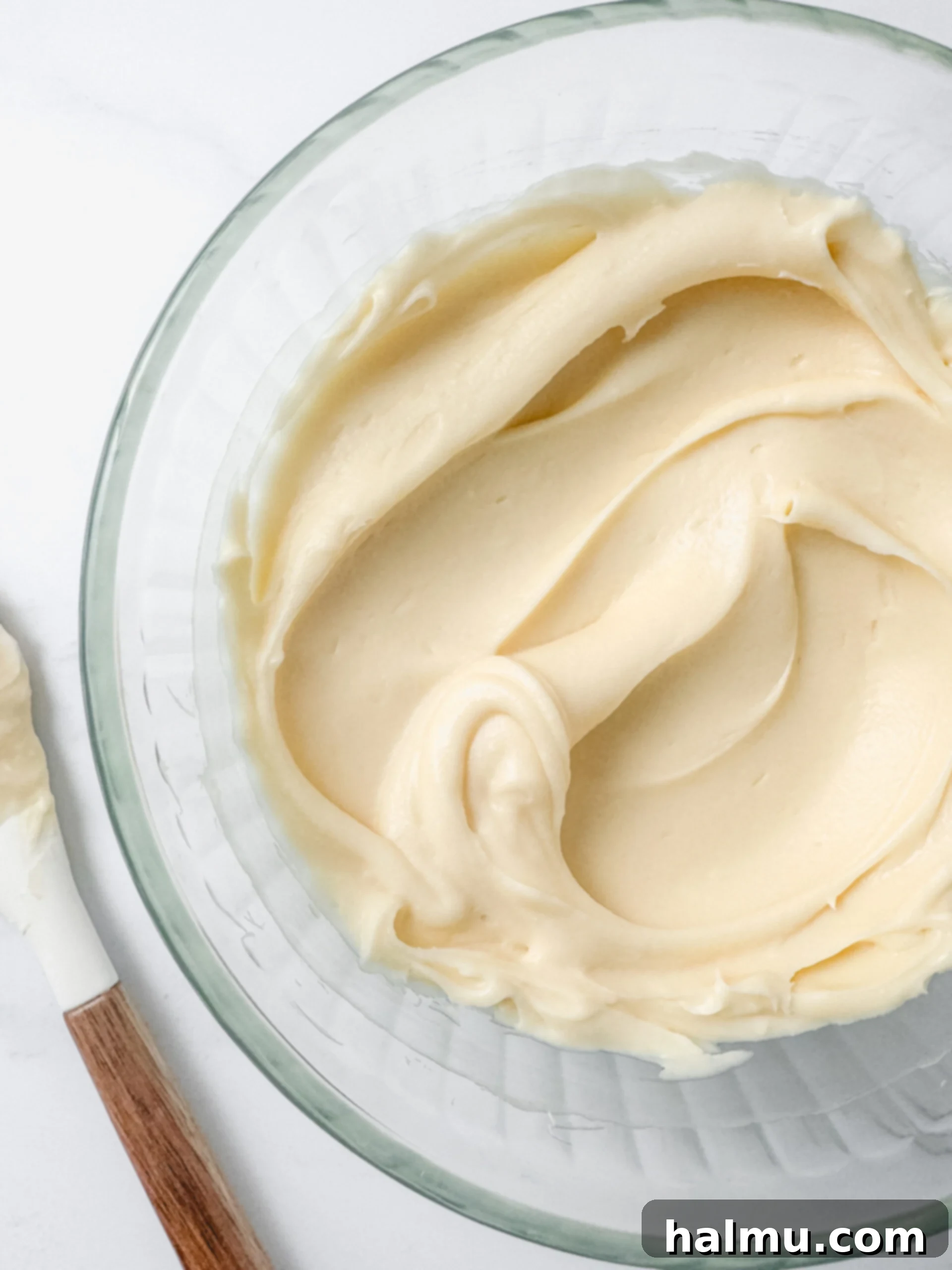 A beautifully frosted carrot cake with velvety cream cheese frosting