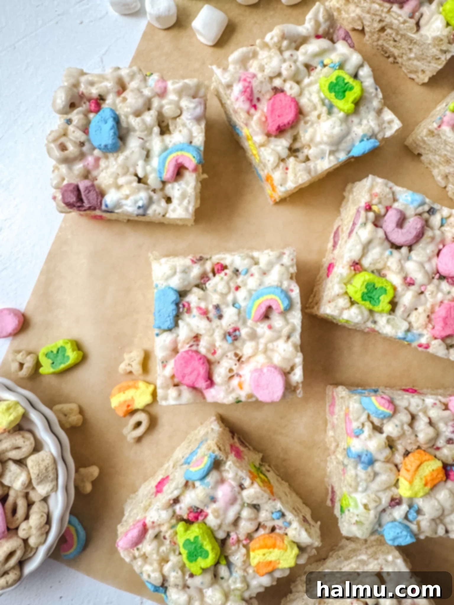 Stacked Lucky Charms Krispie Treats with colorful marshmallows