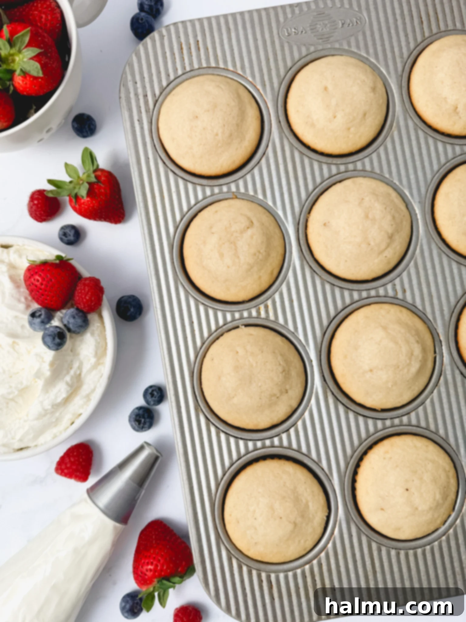 Ingredients for Berry Chantilly Cupcakes laid out on a table