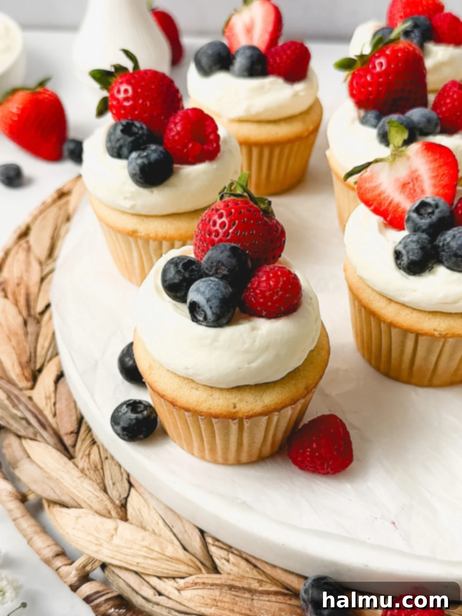 A Berry Chantilly Cupcake ready to be eaten