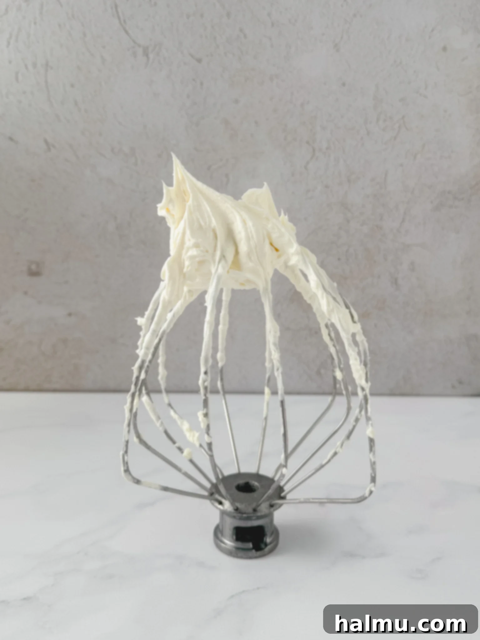 Airy Dream Frosting 3 Close-up of Chantilly frosting in a bowl, showing its creamy texture