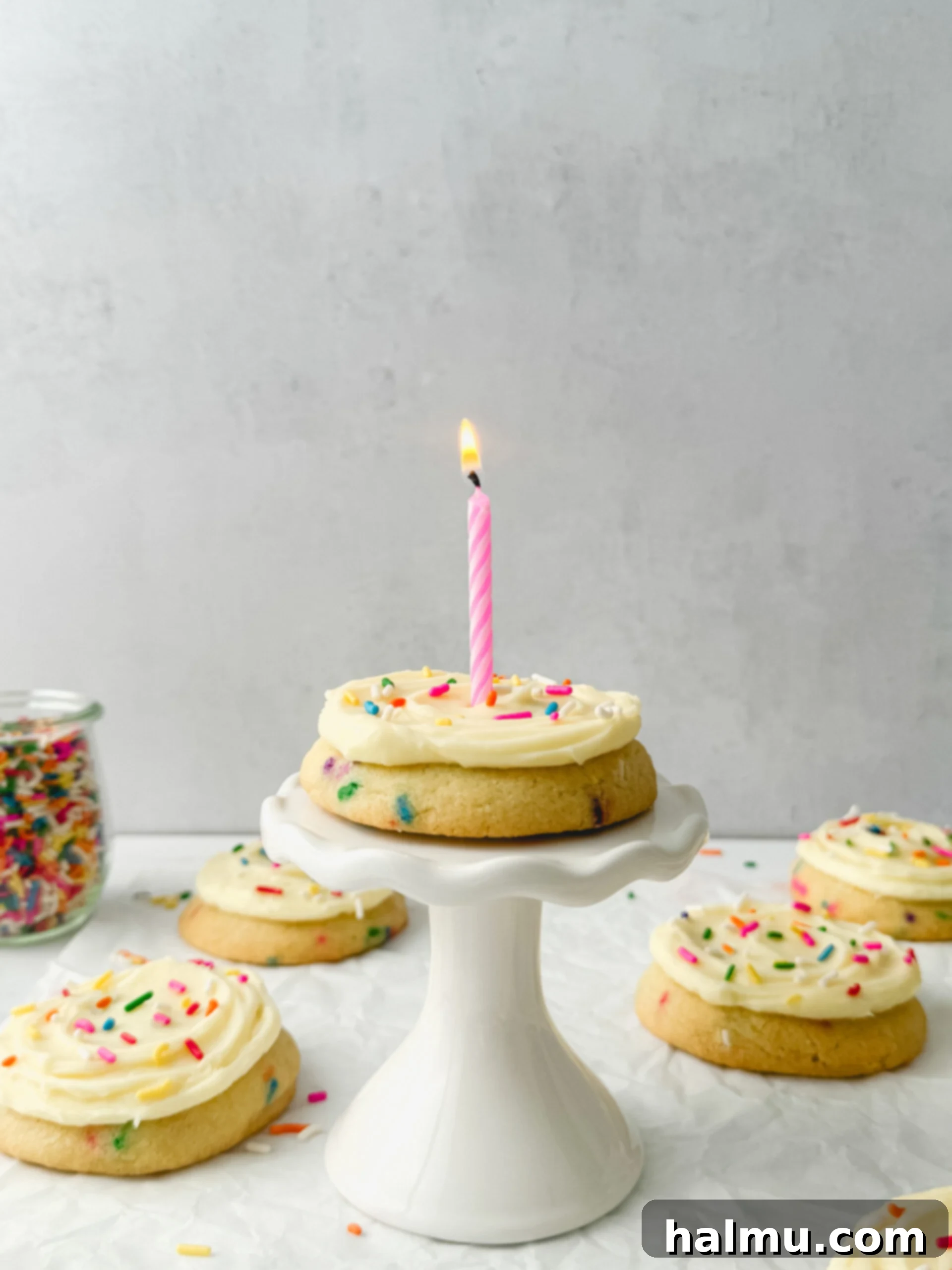 Funfetti Cake Cookies 3 Close-up of frosted Birthday Cake Cookies with rainbow sprinkles