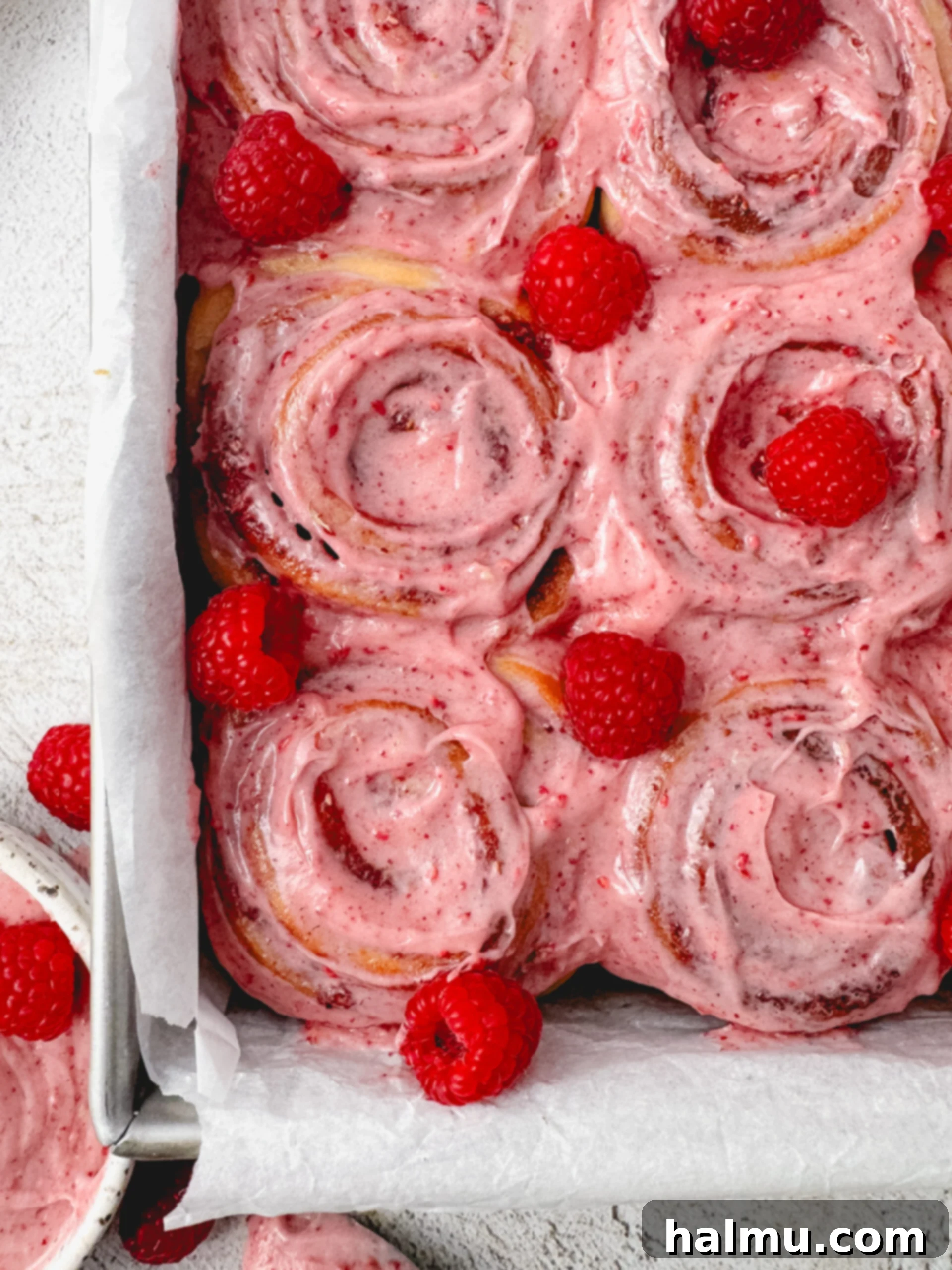 Luscious Raspberry Swirls 2 Delicious Raspberry Sweet Rolls on a baking sheet