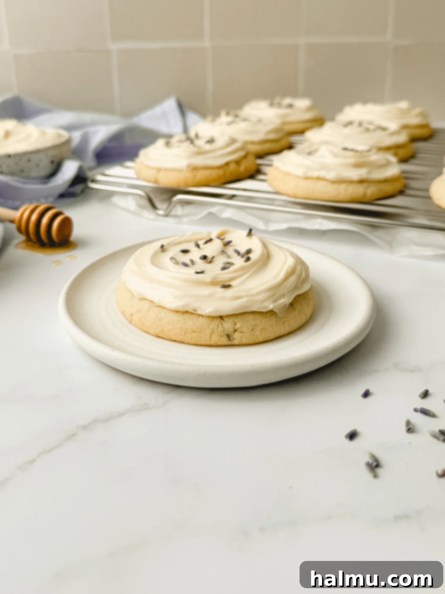 Lavender Kissed Honey Cookies 8 Overhead shot of many frosted Honey Lavender Cookies.