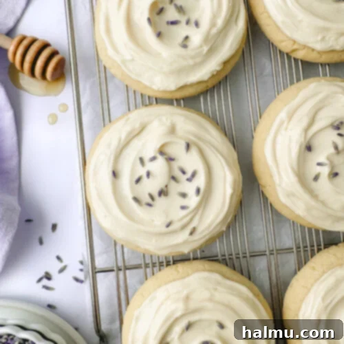 Lavender Kissed Honey Cookies 12 Honey Lavender Cookies stack with creamy frosting.