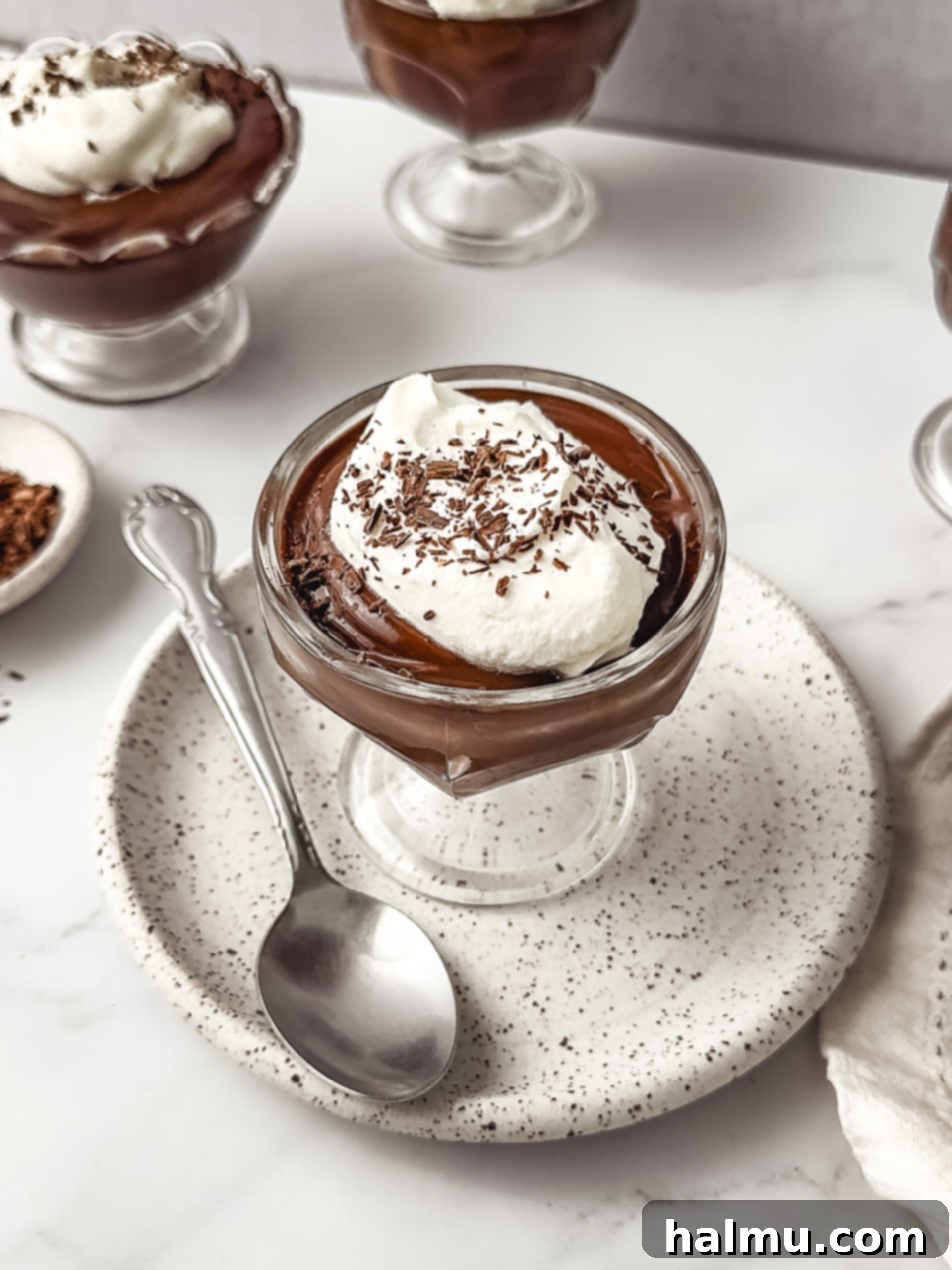 Close-up of the smooth, dark homemade chocolate pudding in a bowl.
