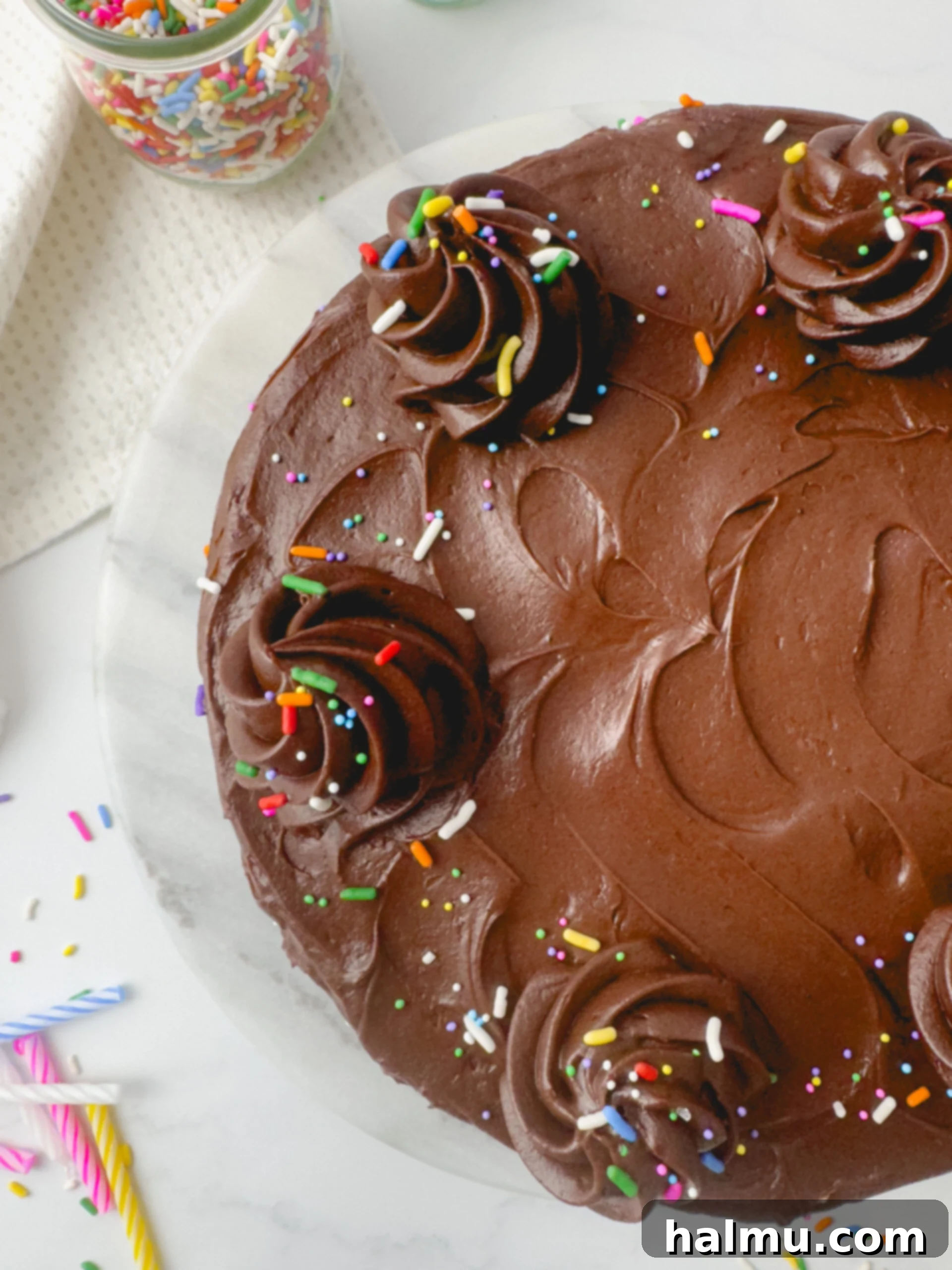 Freshly piped chocolate cream cheese frosting on a dessert, highlighting its beautiful shape.