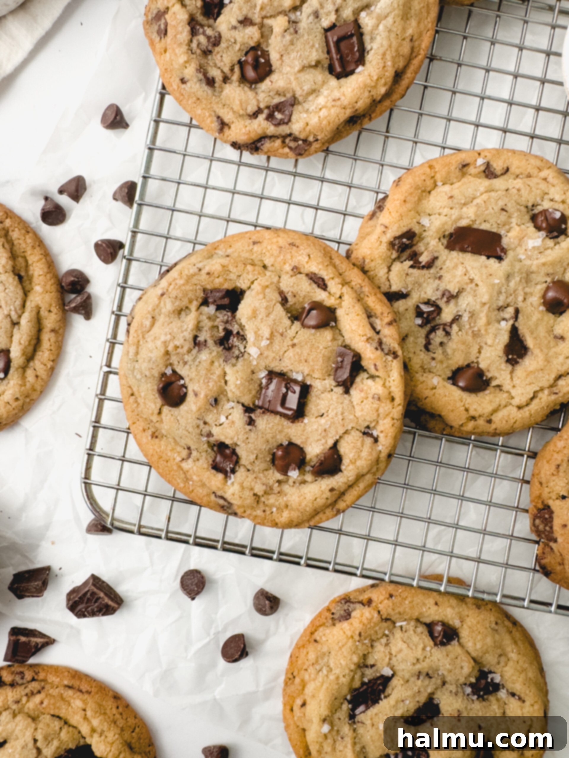 Close-up of frozen cookie dough balls on a baking sheet.