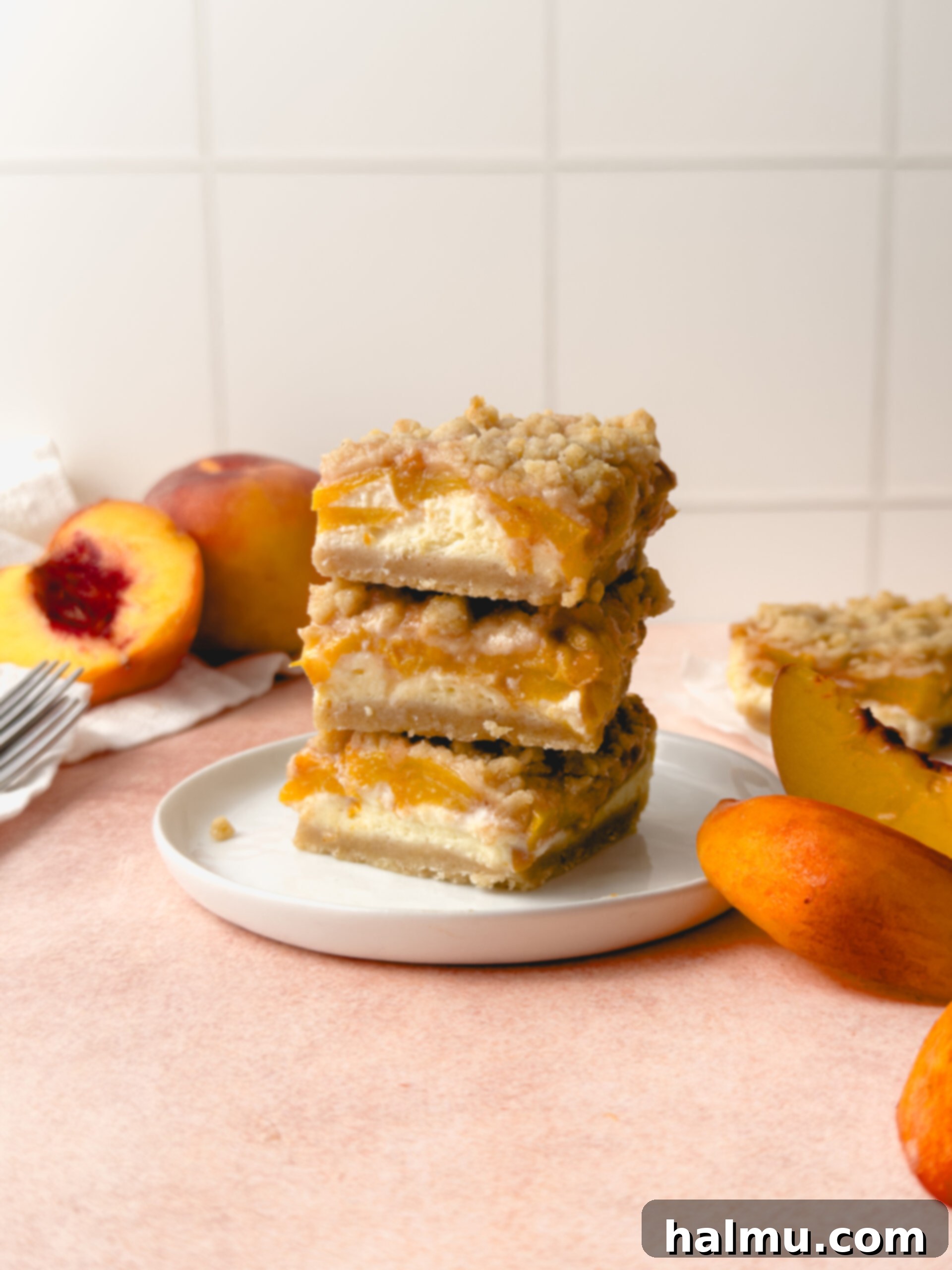 Overhead shot of freshly baked Peaches and Cream Bars in a baking pan.