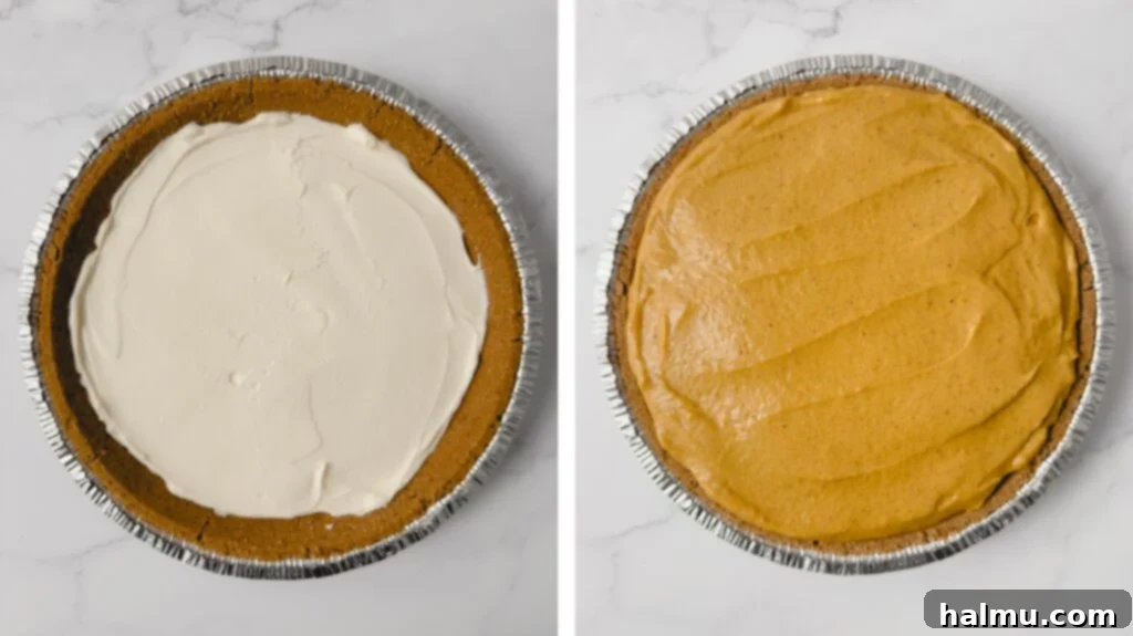 A double layer pumpkin pie being assembled, showing the cream cheese layer already in the crust and pumpkin pudding being spooned on top.