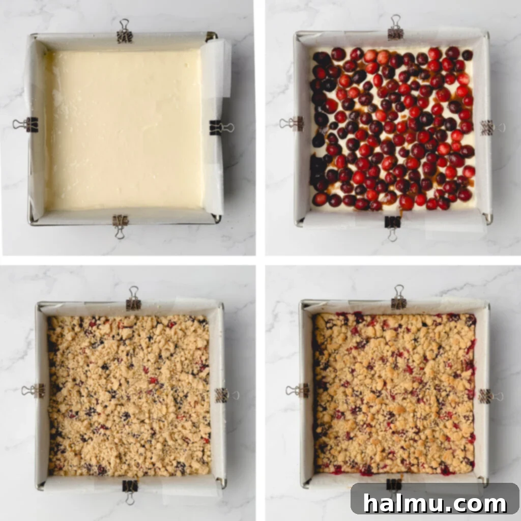 Shortbread crumbles being sprinkled over the cranberry layer.