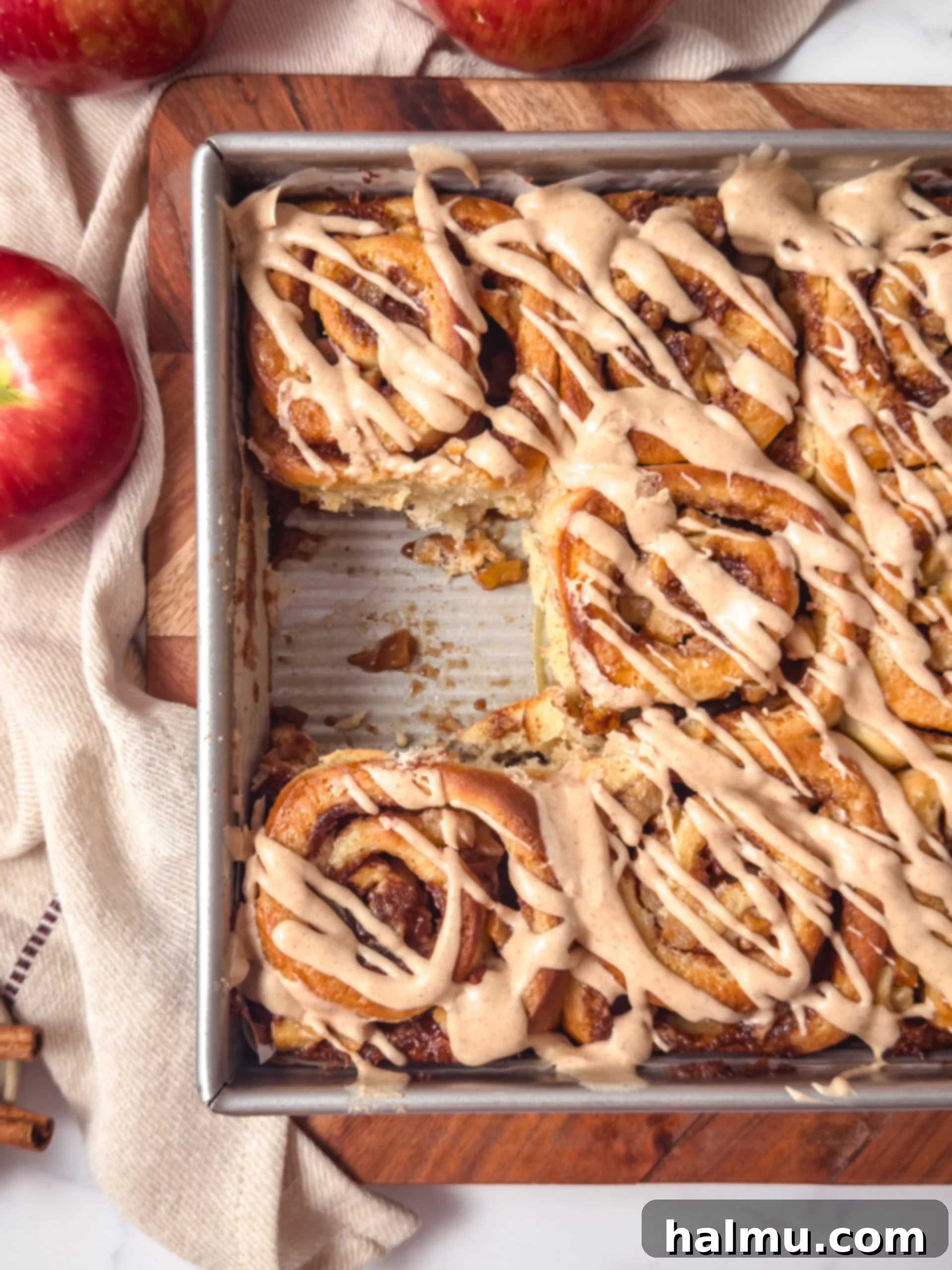 Orchard Apple Cinnamon Swirls 2 Freshly baked apple pie cinnamon rolls with a maple glaze