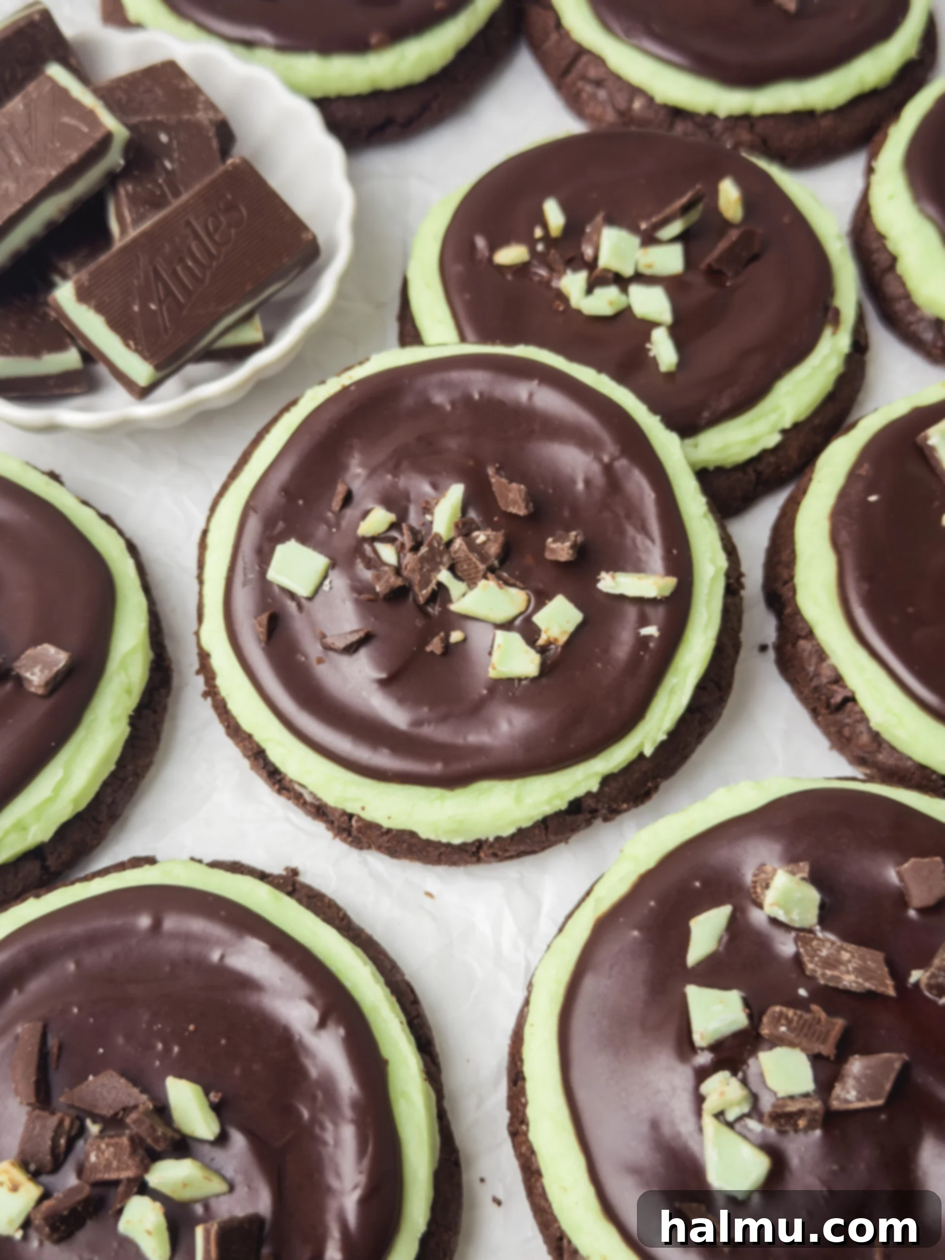 Frosted Andes Mint Dreams 2 Delicious frosted Andes chocolate mint cookie, layered with green mint frosting, chocolate ganache, and crushed Andes mints.