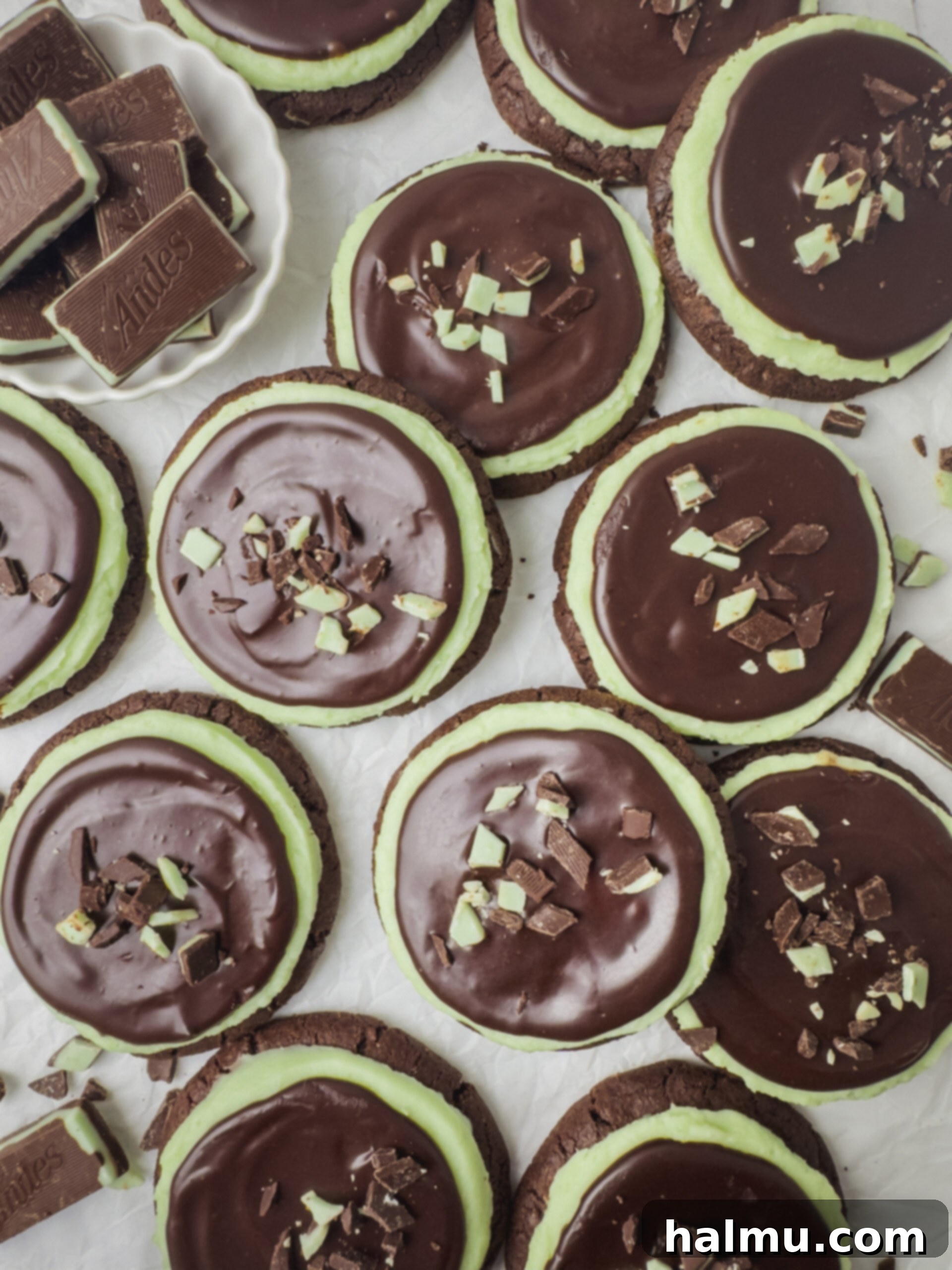 Frosted Andes Mint Dreams 6 A tray of beautifully frosted Andes chocolate mint cookies, showcasing their inviting green and brown layers.