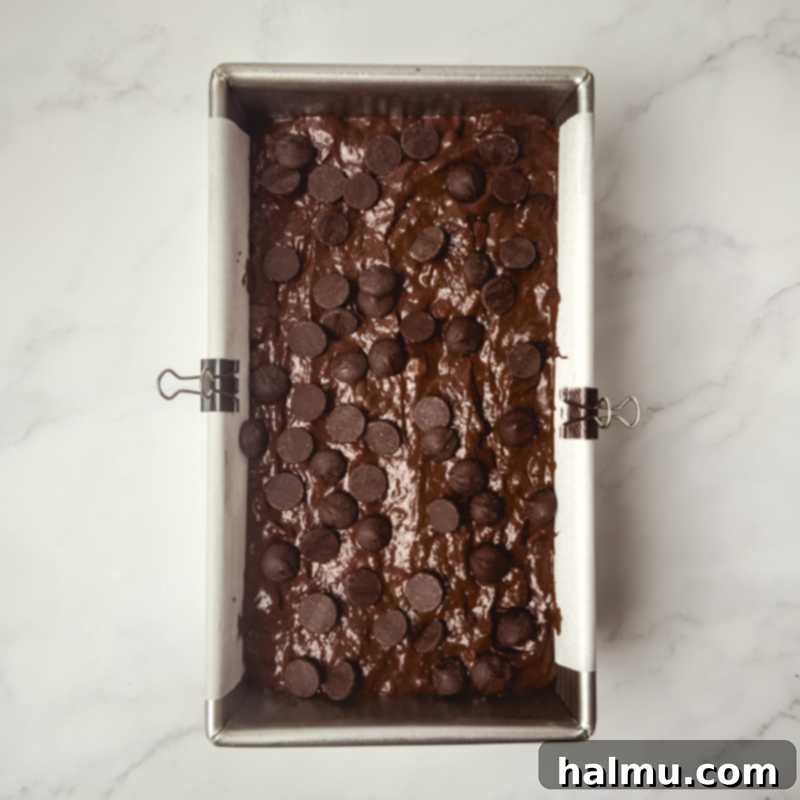 Chocolate banana bread batter with chocolate chips folded in.