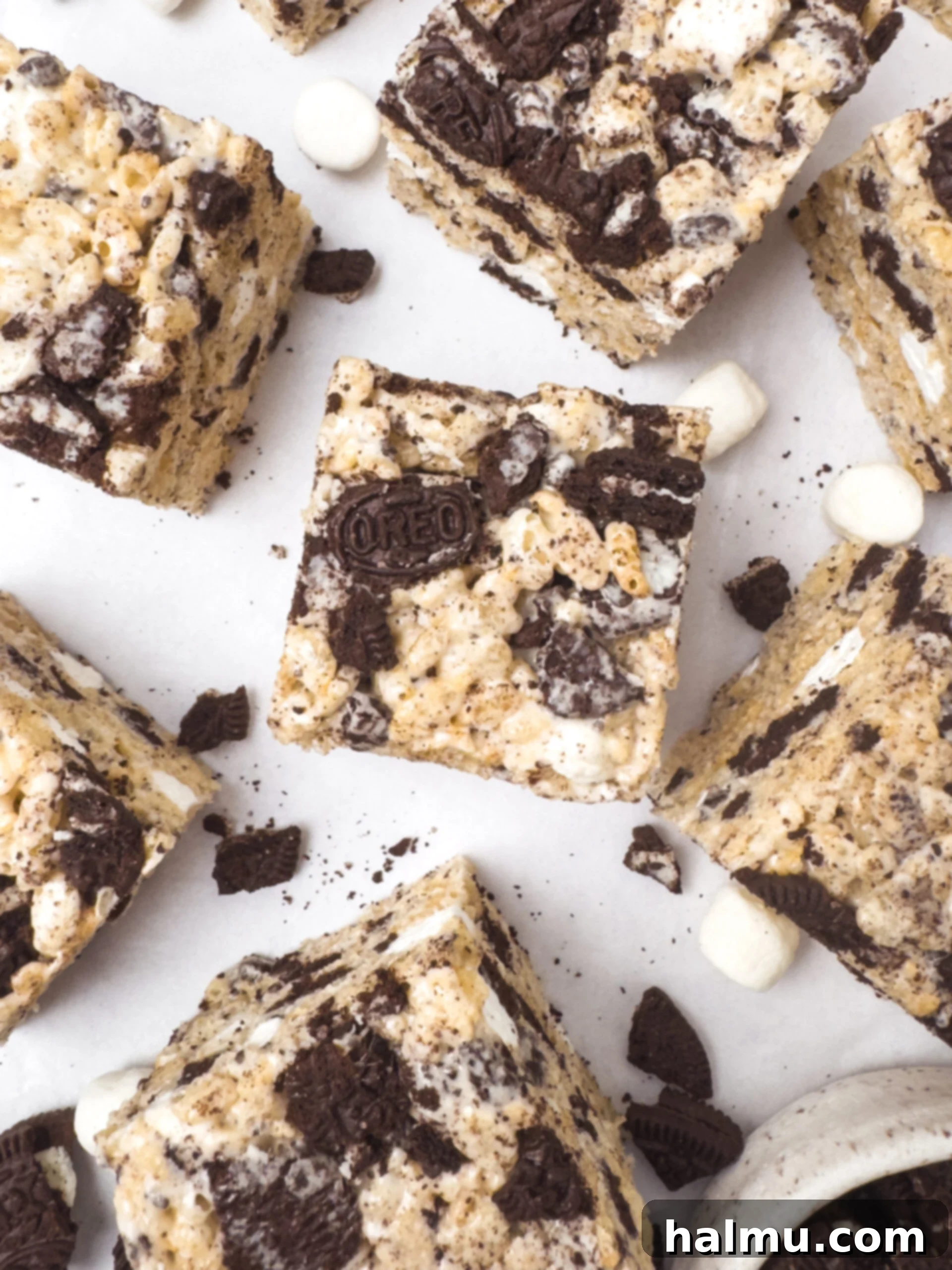 Oreo Krispie Treats 3 A bowl of rice cereal mixed with chopped Oreo cookies and mini marshmallows, ready to be combined with melted marshmallow mixture.