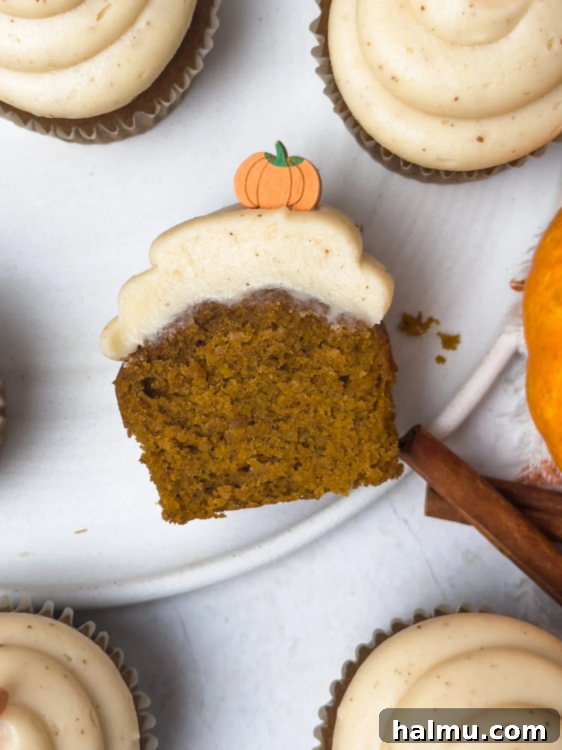 Pumpkin Cupcakes with Cream Cheese Swirl 3 Close up of Pumpkin Cupcakes with Brown Butter Frosting