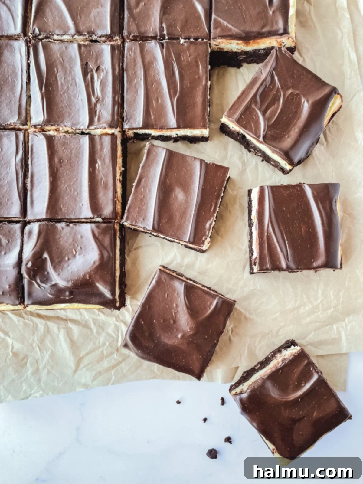 Platter of perfectly sliced Baileys Irish Cream Cheesecake Brownies